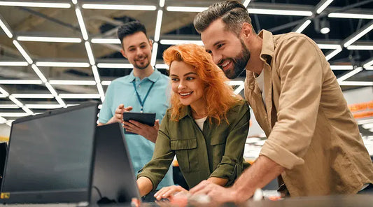 Customer trading in a used smartphone at PayMore Reston