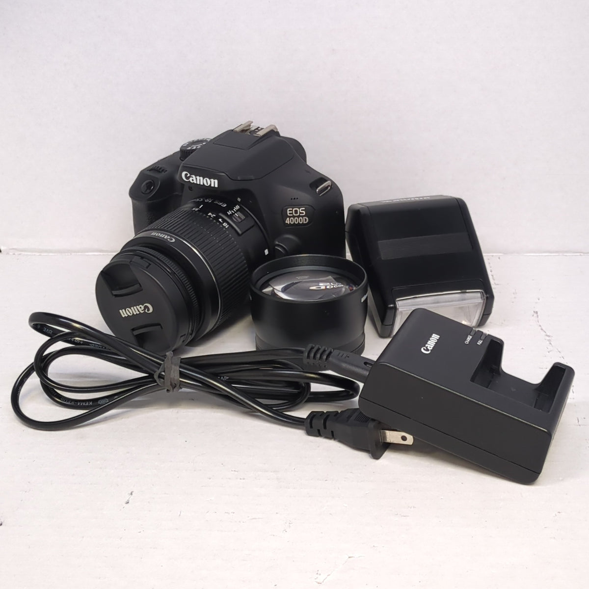 Canon EOS 4000D 18.0MP DSLR Camera Black w/ EF-S 18-55mm III Lens & Flash Kit