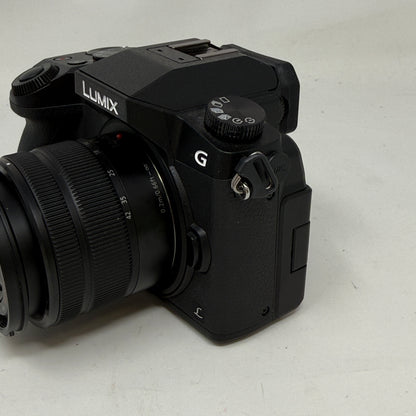 Panasonic Lumix DMC-G7 4K Mirrorless Camera w/14-42mm Lens,Charger & Hood Black